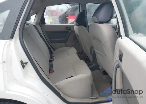 2010 Ford Focus S из США, поврежденный, VIN 1FAHP3EN2AW266175